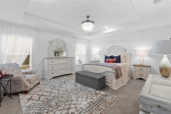 a bed room with a bed and a couch