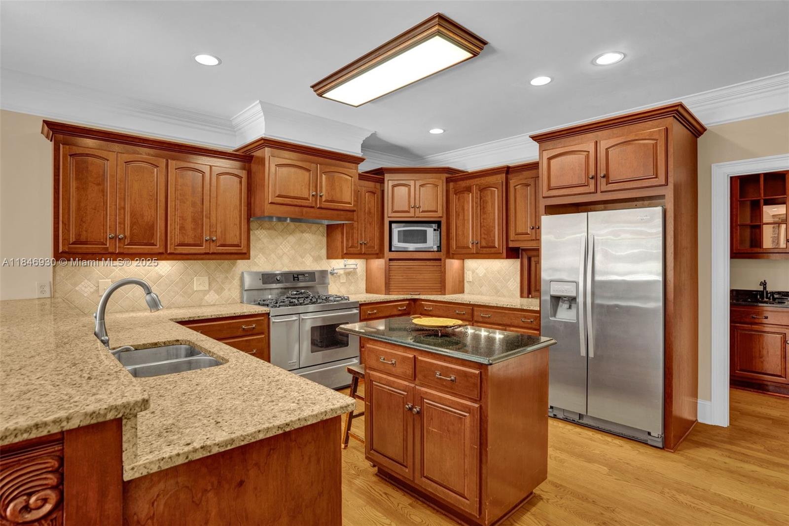 2579 Grey Rabbit Run Asheboro, NC 27205 - Photo 16 of 72 a kitchen with stainless steel appliances granite countertop a stove refrigerator sink and cabinets