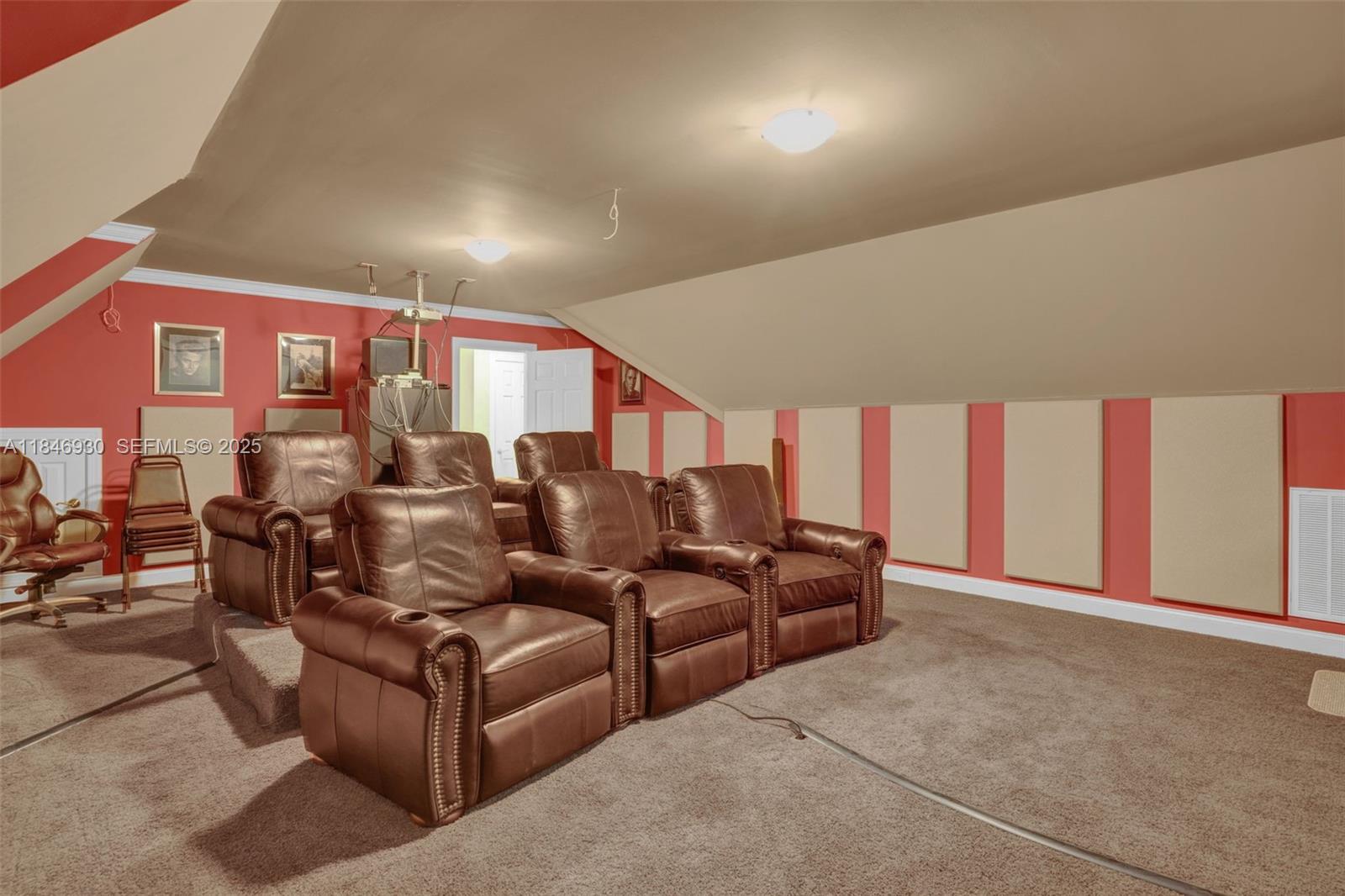 2579 Grey Rabbit Run Asheboro, NC 27205 - Photo 35 of 72 a media room with lots of chairs and a projector screen