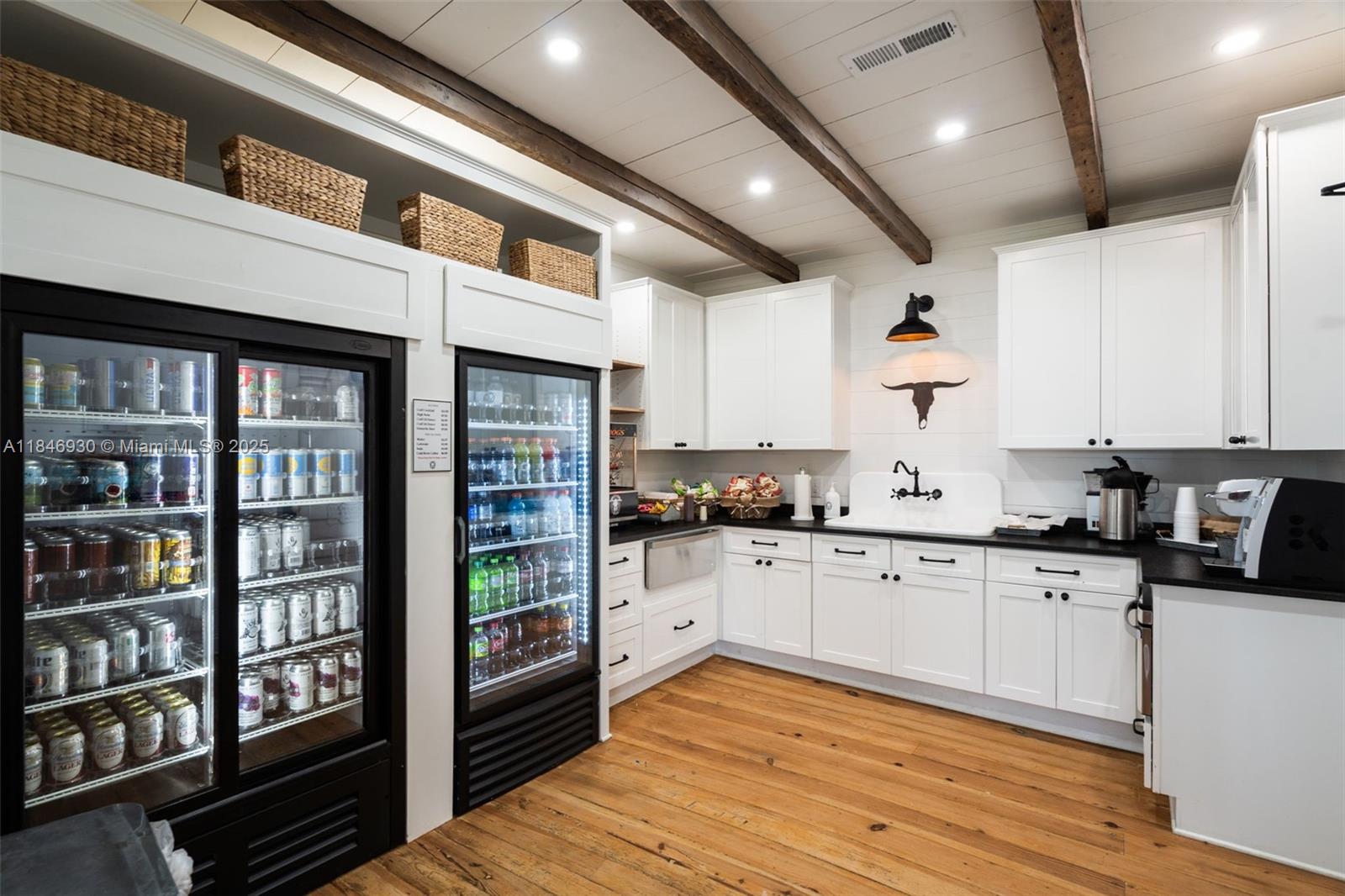 2579 Grey Rabbit Run Asheboro, NC 27205 - Photo 68 of 72 a large kitchen with stainless steel appliances granite countertop a lot of cabinets and wooden floor