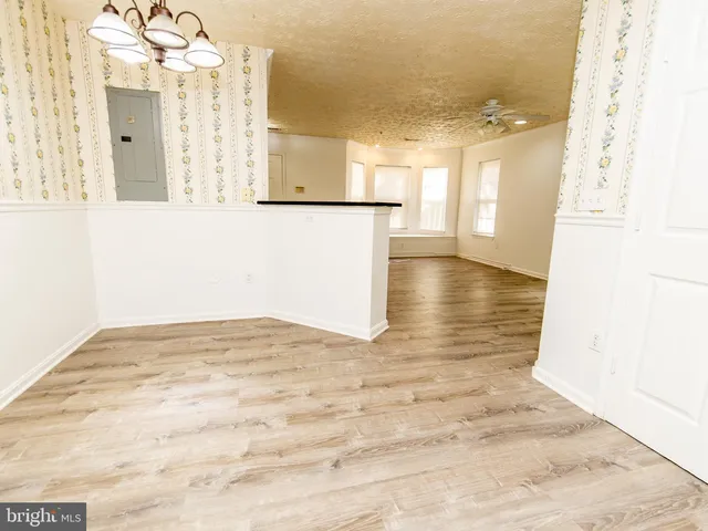 a view of a kitchen with a sink