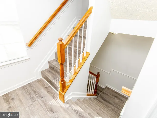 a view of entryway with wooden floor