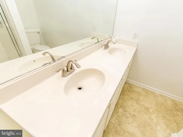 a bathroom with a sink and a tub