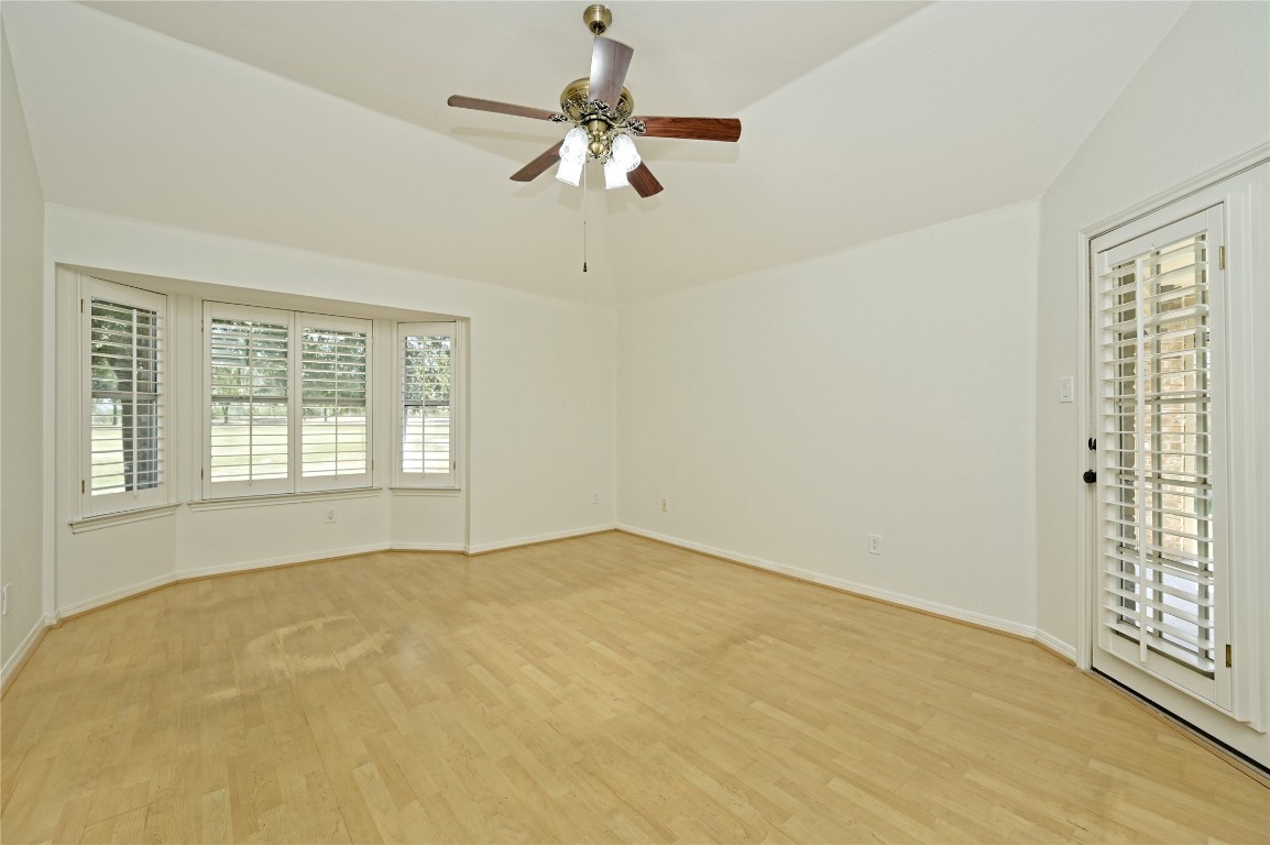 10917 Ballybunion Place Austin, TX 78747 - Photo 16 of 28 a view of an empty room with a window