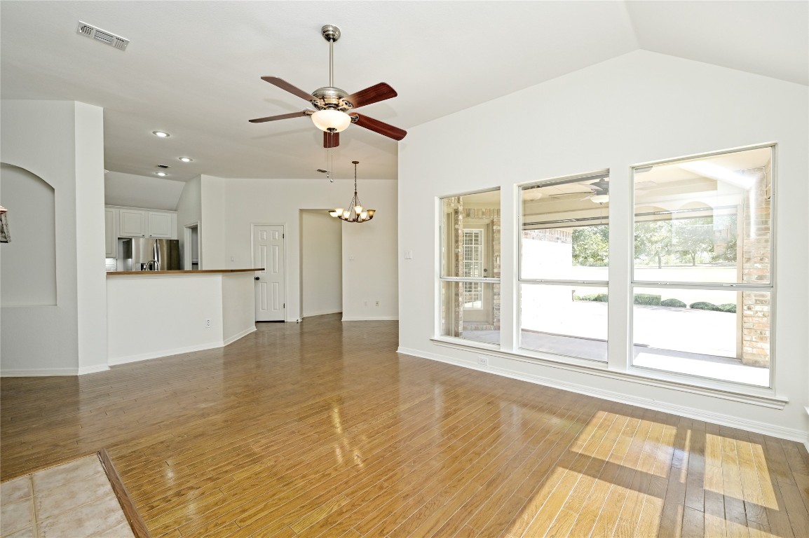 10917 Ballybunion Place Austin, TX 78747 - Photo 6 of 28 a view of an empty room with a window