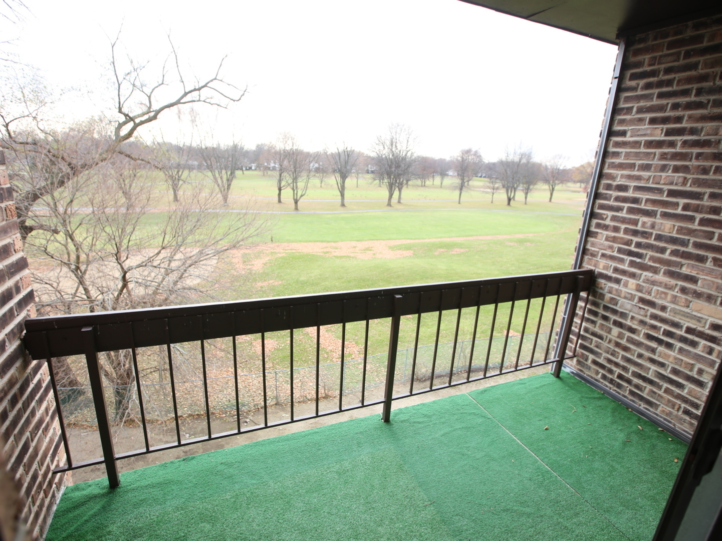 1400 North Elmhurst Road, Unit 417 Mount Prospect, IL 60056 - Photo 15 of 15 a view of outdoor space with deck and yard