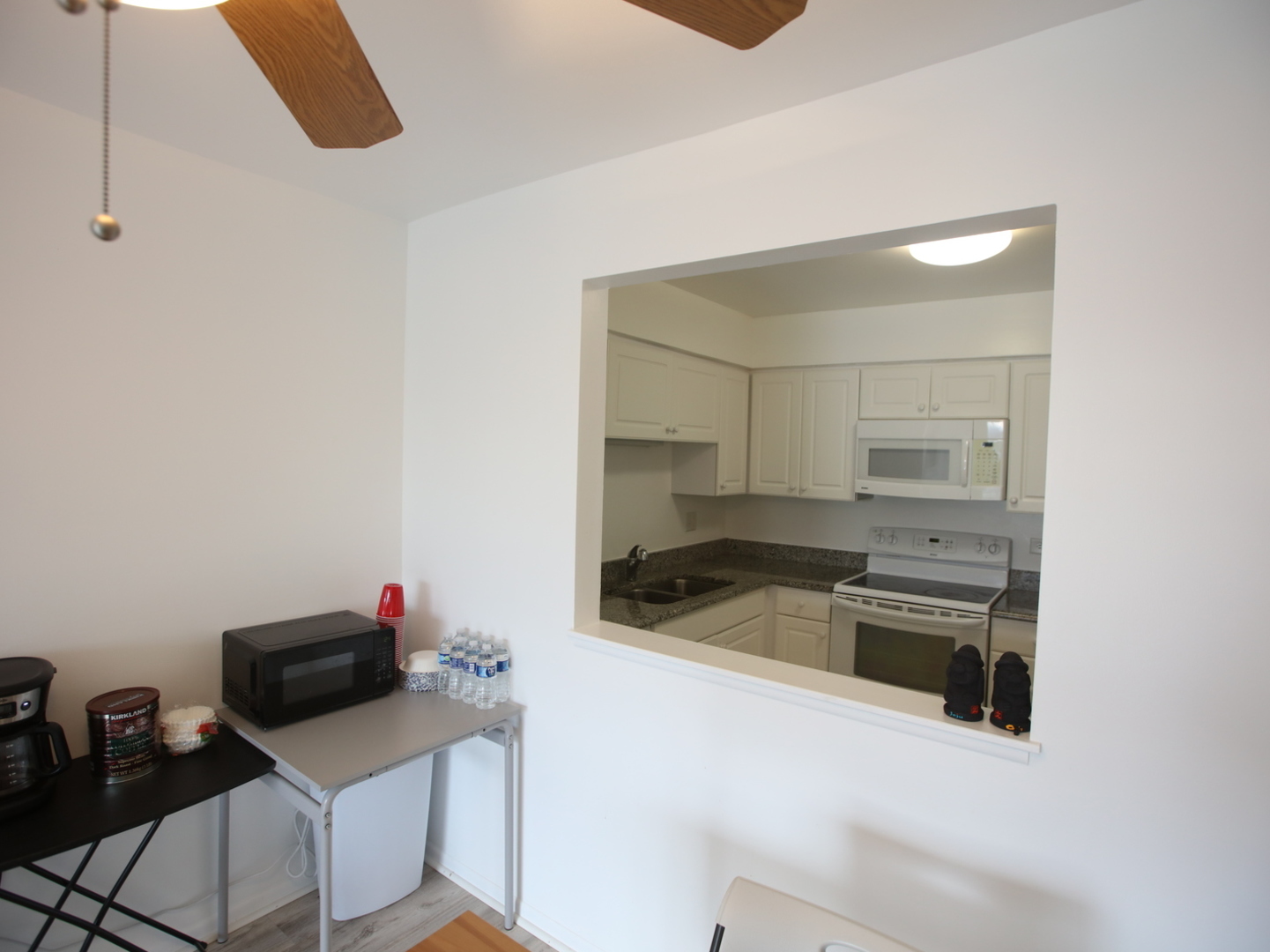 1400 North Elmhurst Road, Unit 417 Mount Prospect, IL 60056 - Photo 8 of 15 a kitchen that has a sink and a stove