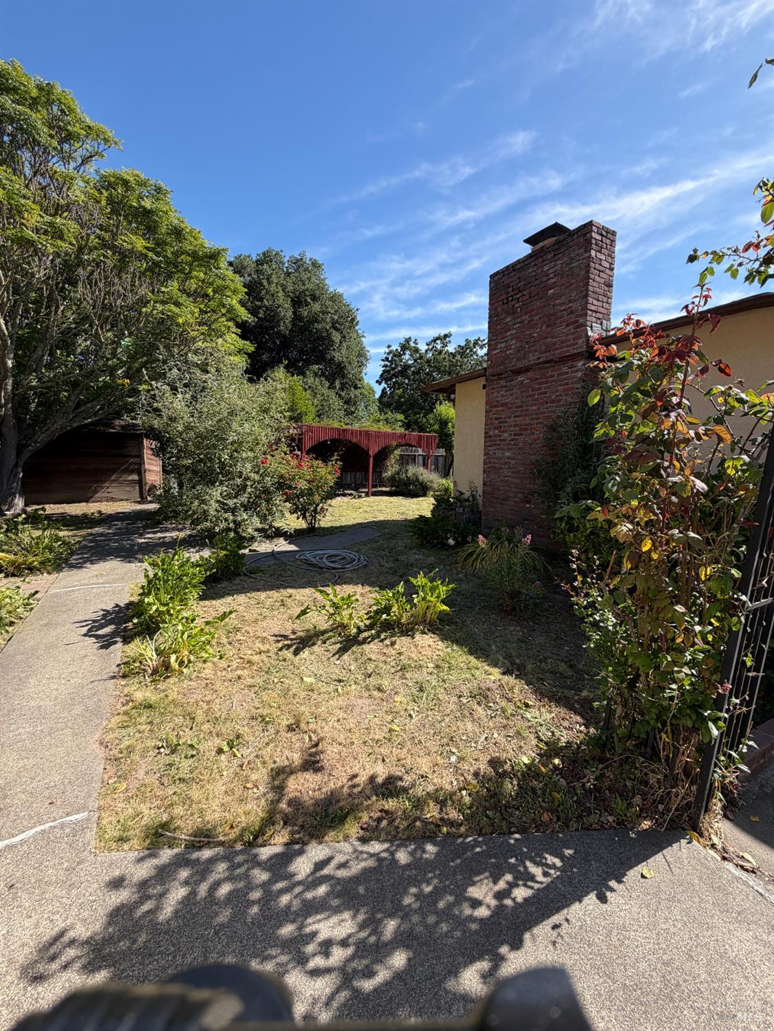1927 Marsh Road Santa Rosa, CA 95403 - Photo 14 of 29 a view of a yard with cars parked