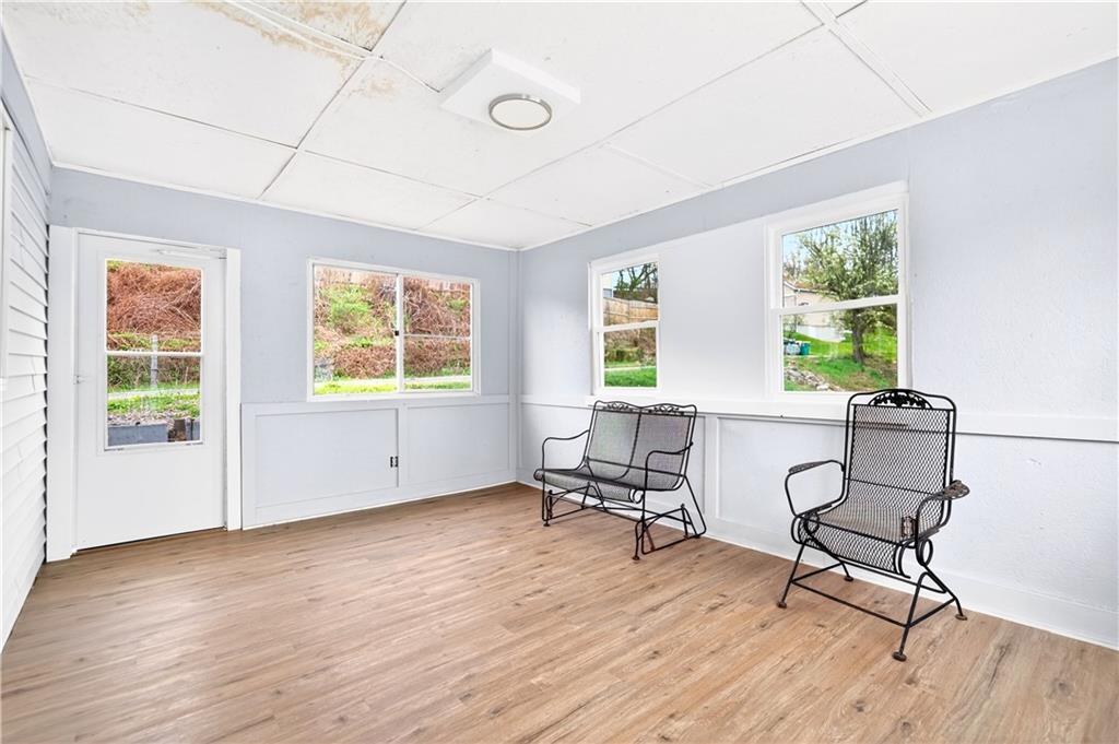 93 Old 51 Road Perryopolis, PA 15473 - Photo 31 of 44 a workspace with wooden floor and a window