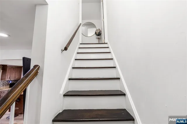 a bedroom with a bed and a desk