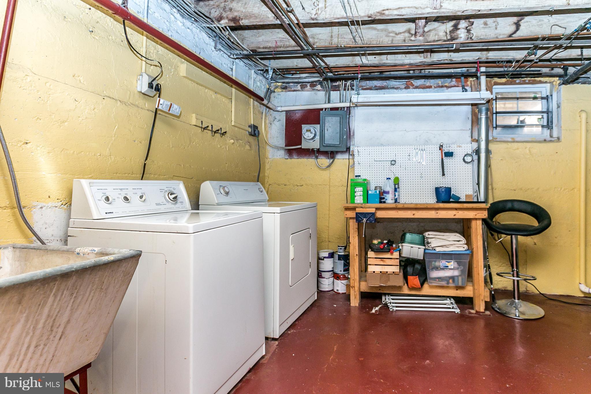 607 Harding Place Baltimore, MD 21211 - Photo 21 of 25 Basement with washer & dryer