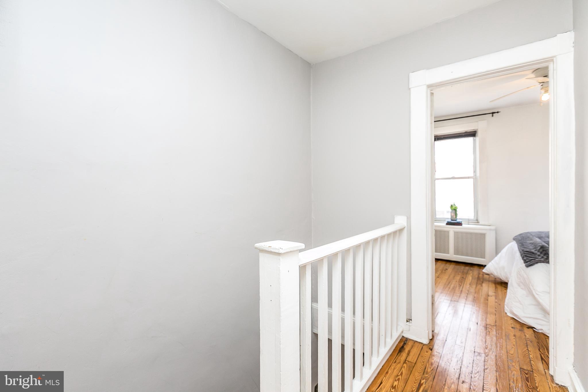 607 Harding Place Baltimore, MD 21211 - Photo 10 of 25 Upstairs hallway looking into front bedroom