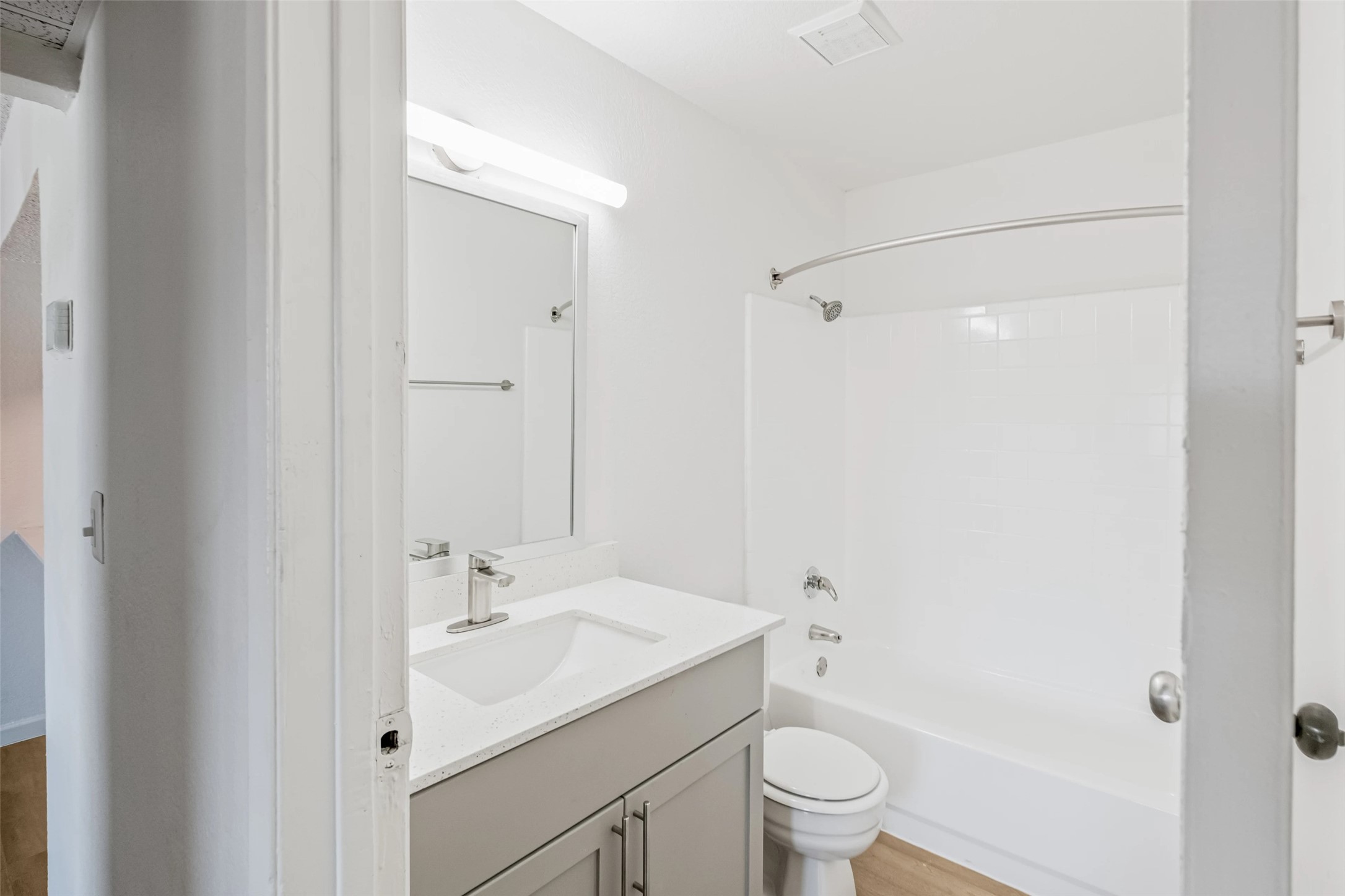 4600 West Pioneer Drive, Unit 13 Irving, TX 75061 - Photo 14 of 48 a bathroom with a sink toilet and shower