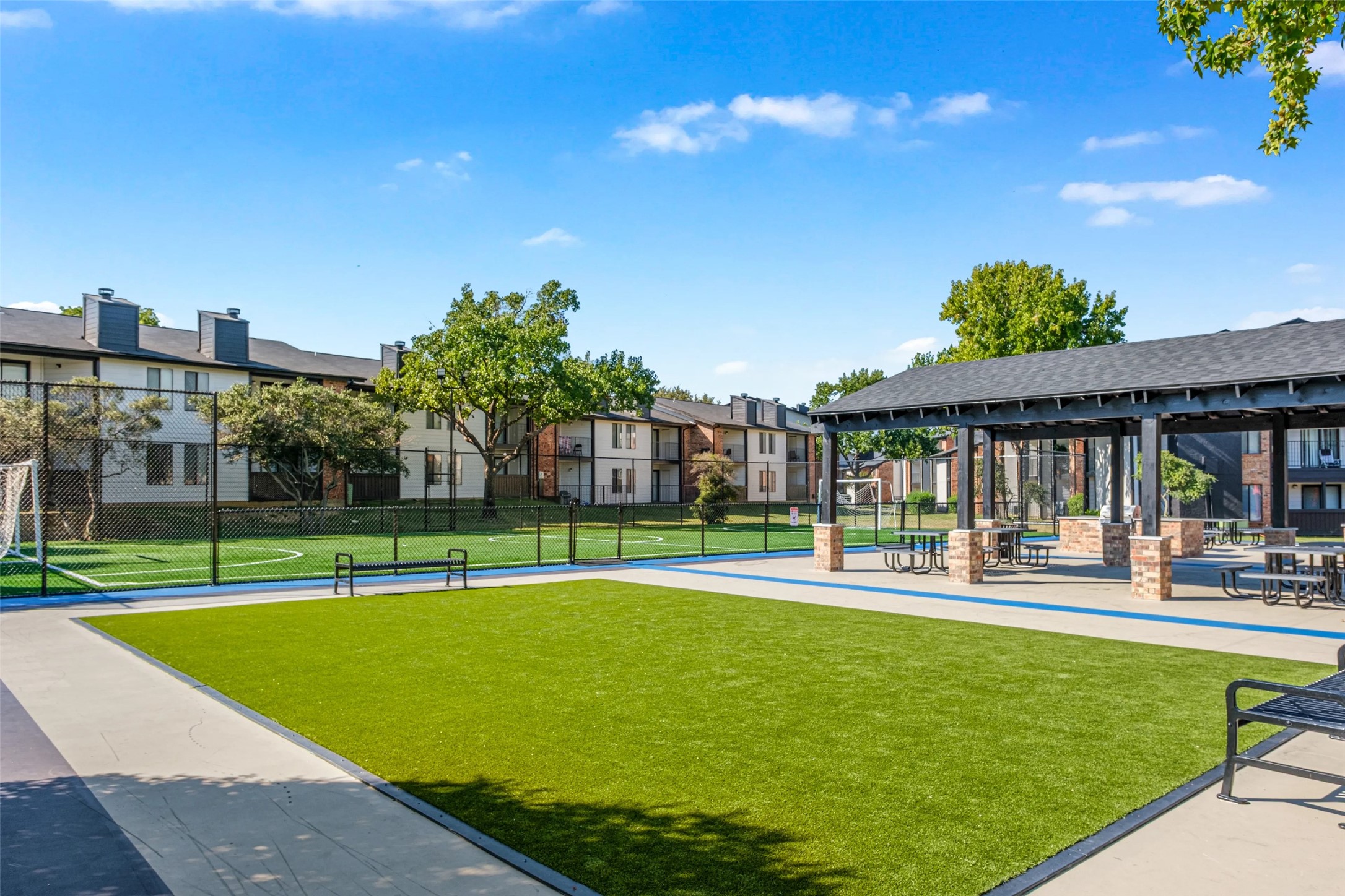 4600 West Pioneer Drive, Unit 13 Irving, TX 75061 - Photo 45 of 48 a view of a swimming pool and a yard