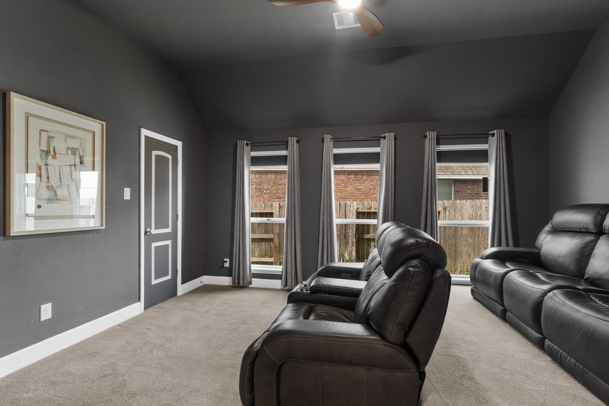 3426 Summer Ranch Drive Katy, TX 77494 - Photo 19 of 48 This dedicated media space offers a comfortable retreat for streaming, gaming, or watching the big game, with plenty of room for multiple seating arrangements and a cozy, immersive atmosphere.
