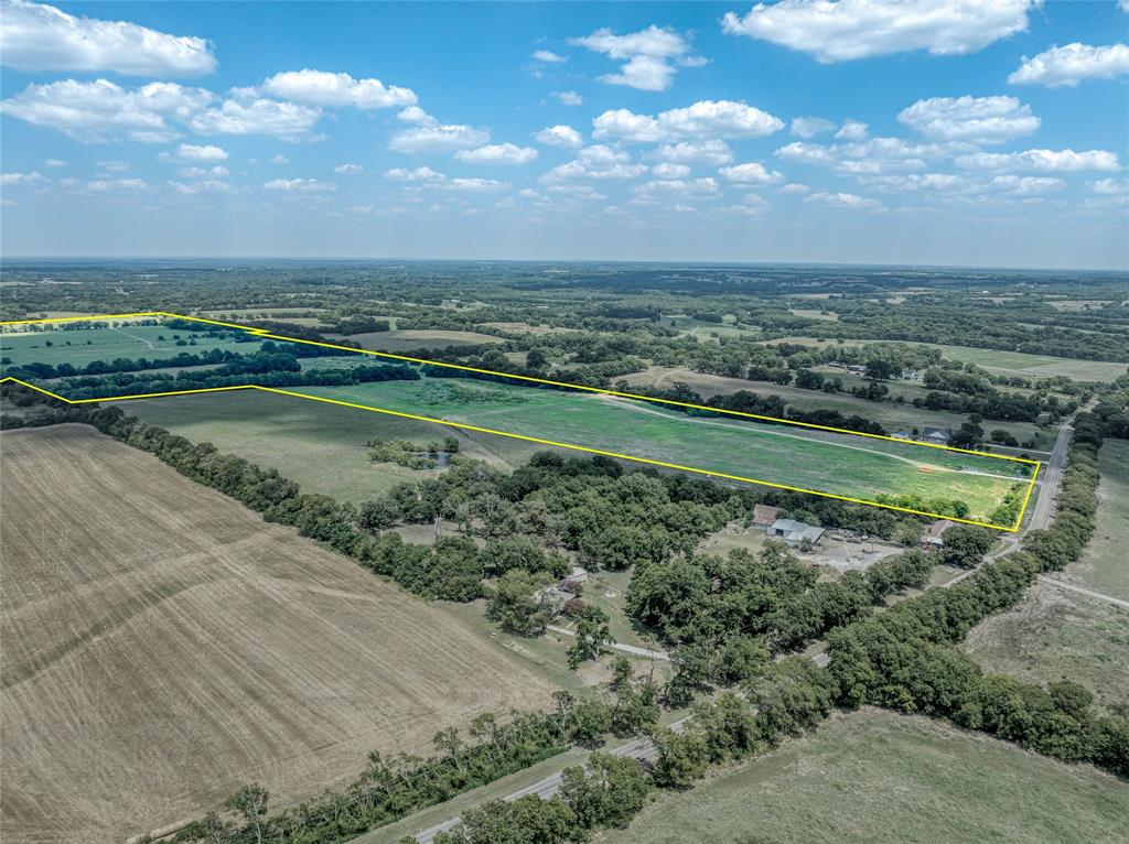 216-acres JP Cave Road Sherman, TX 75090 - Photo 3 of 10 a view of a lake with a city