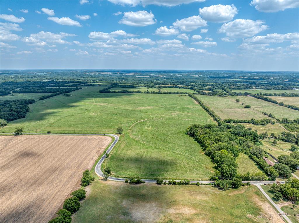 216-acres JP Cave Road Sherman, TX 75090 - Photo 8 of 10 a view of an outdoor space and a yard
