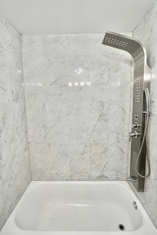 a bathroom with a bathtub