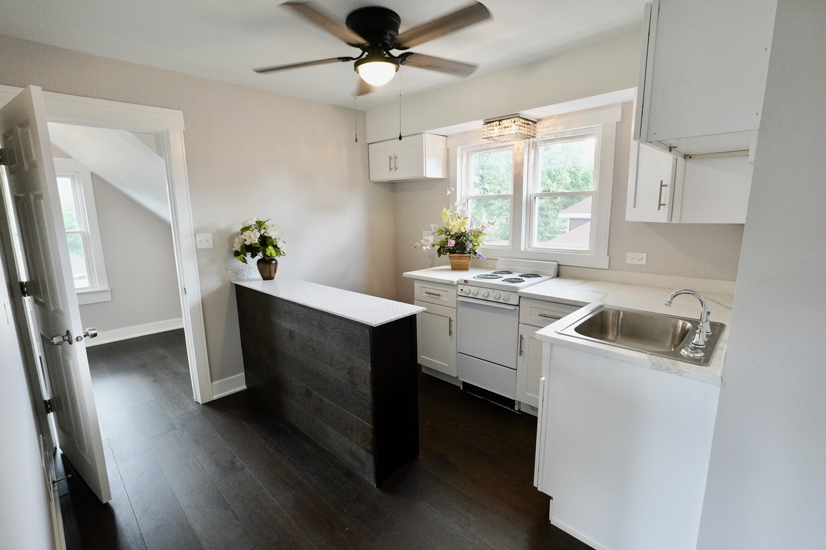 8734 South Honore Street Chicago, IL 60620 - Photo 20 of 33 a room with a sink wooden floor and window