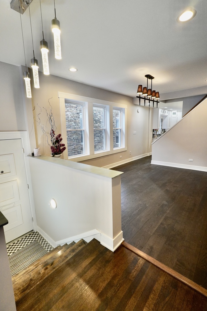 8734 South Honore Street Chicago, IL 60620 - Photo 3 of 33 a view of a kitchen with a sink and a window