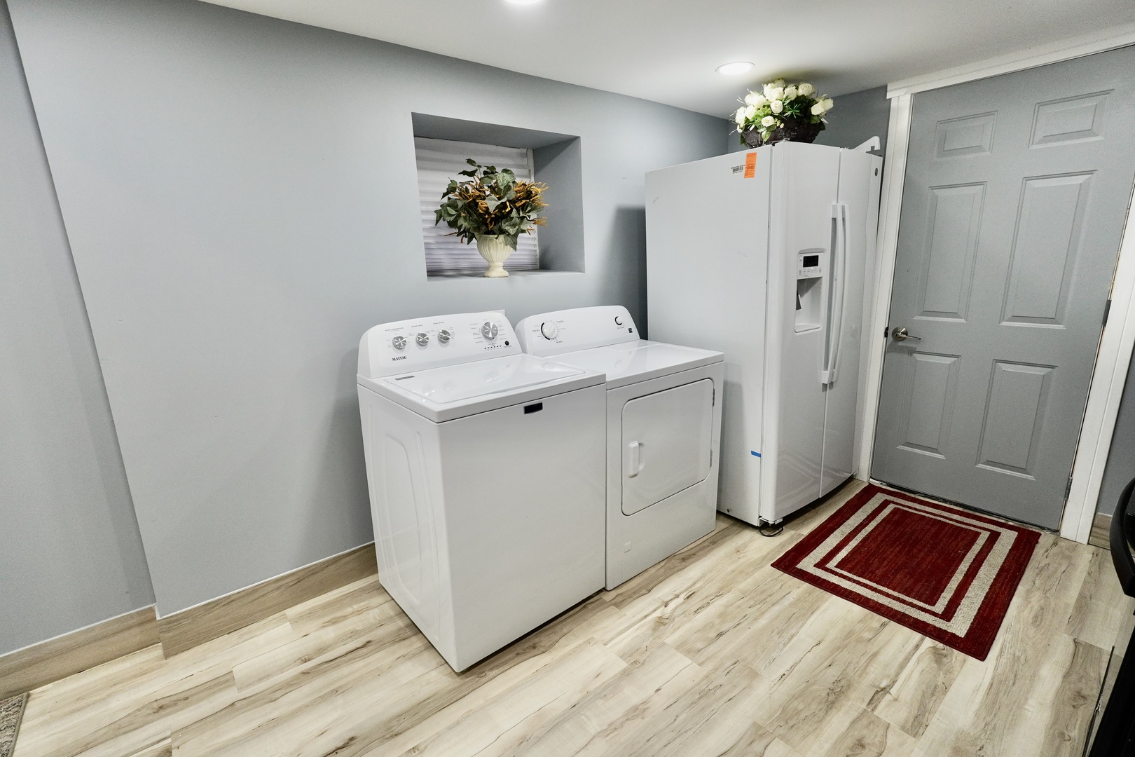 8734 South Honore Street Chicago, IL 60620 - Photo 31 of 33 a view of utility room with closet and wooden floor