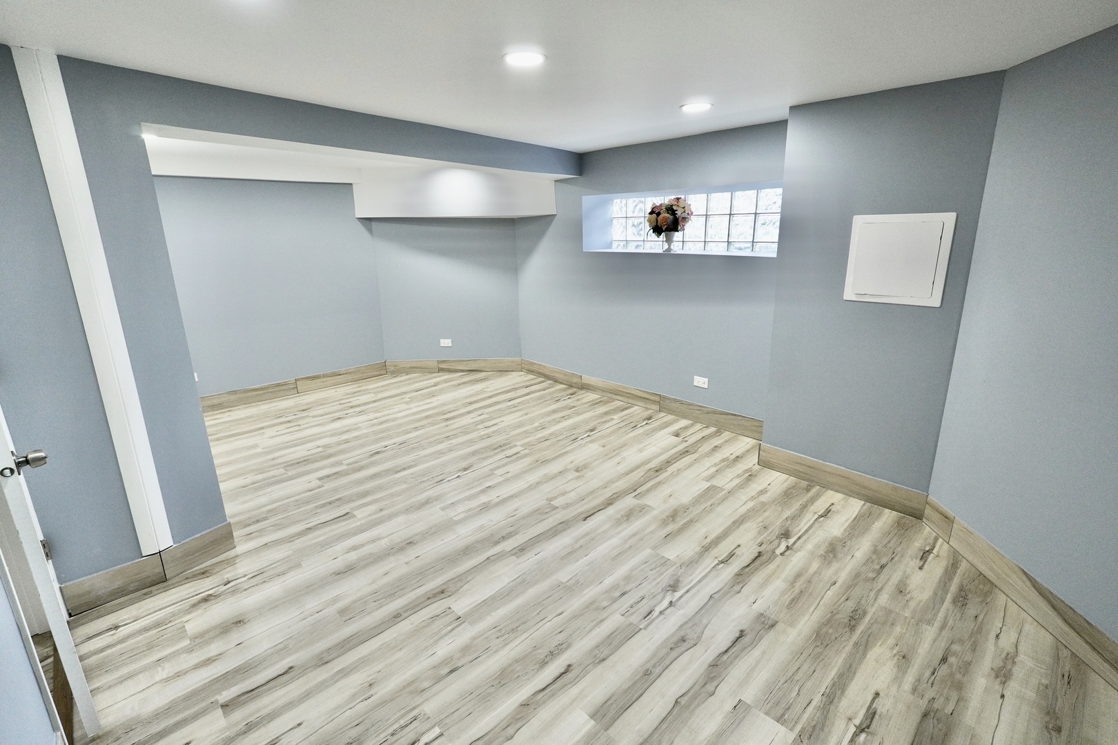 8734 South Honore Street Chicago, IL 60620 - Photo 32 of 33 a view of empty room with wooden floor