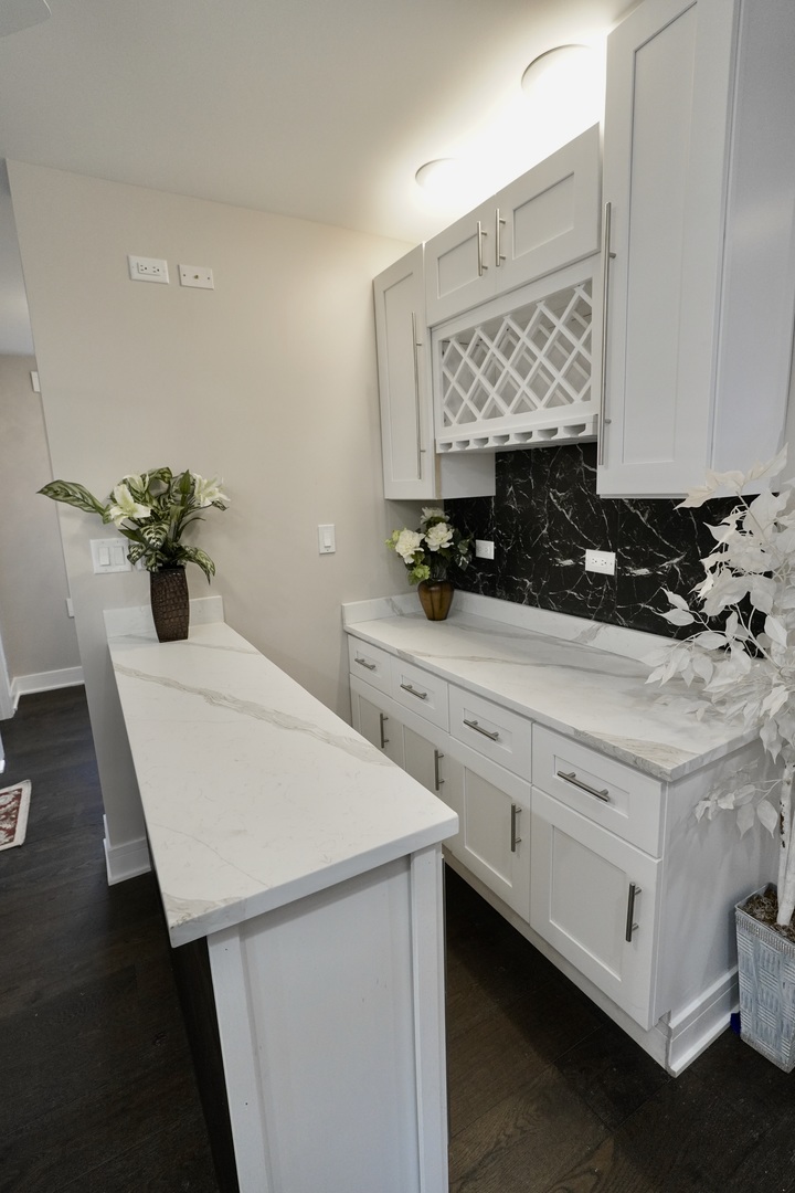 8734 South Honore Street Chicago, IL 60620 - Photo 7 of 33 a kitchen with a sink and cabinets