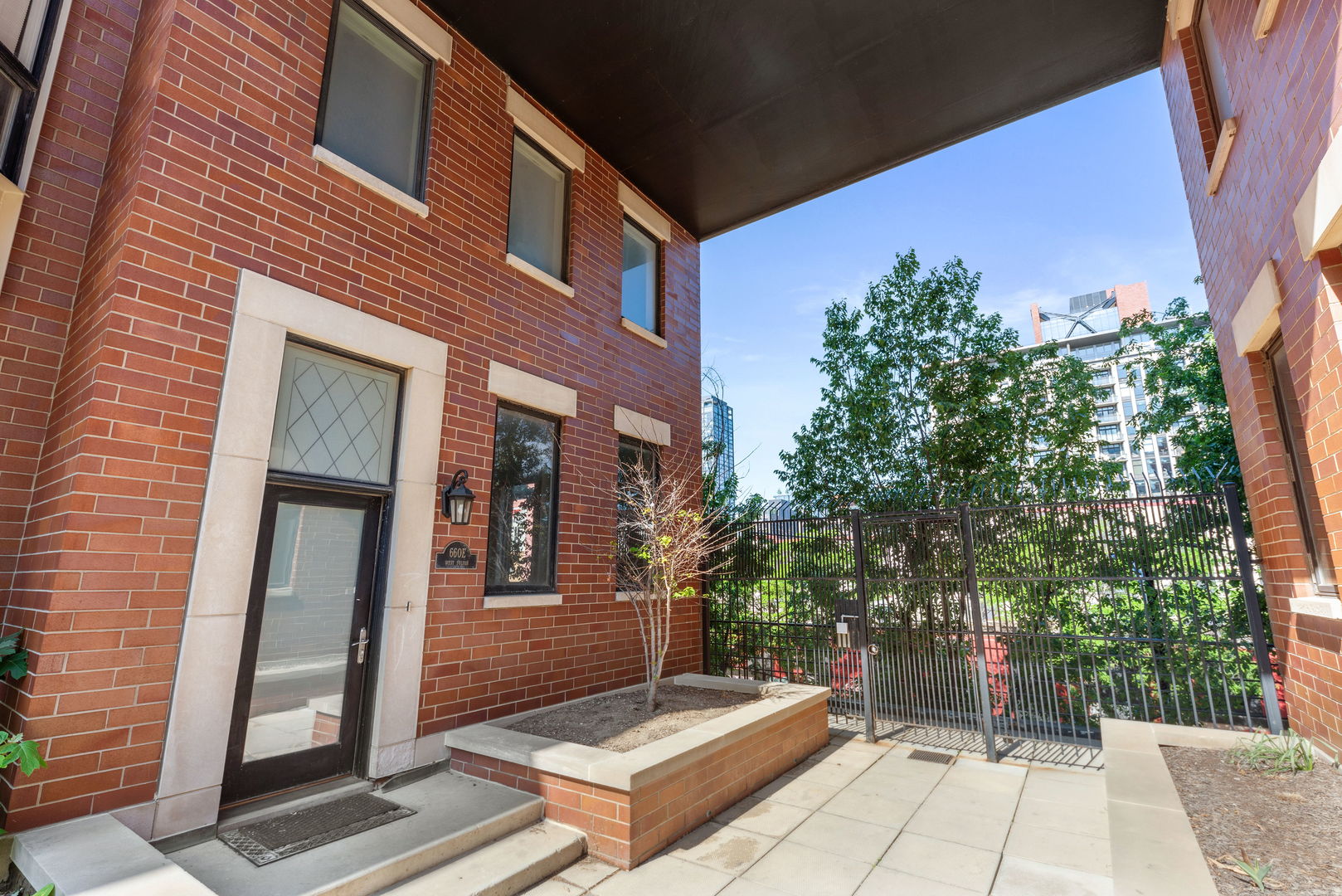 660 West Fulton Street, Unit E Chicago, IL 60661 - Photo 1 of 1 a view of house with a outdoor space