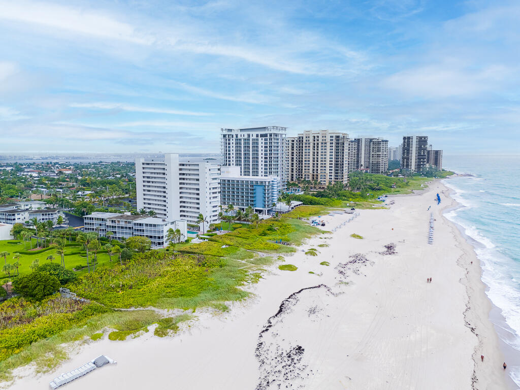 3600 North Ocean Drive, Unit 421 Singer Island, FL 33404 - Photo 21 of 31 a view of a swimming pool with a yard
