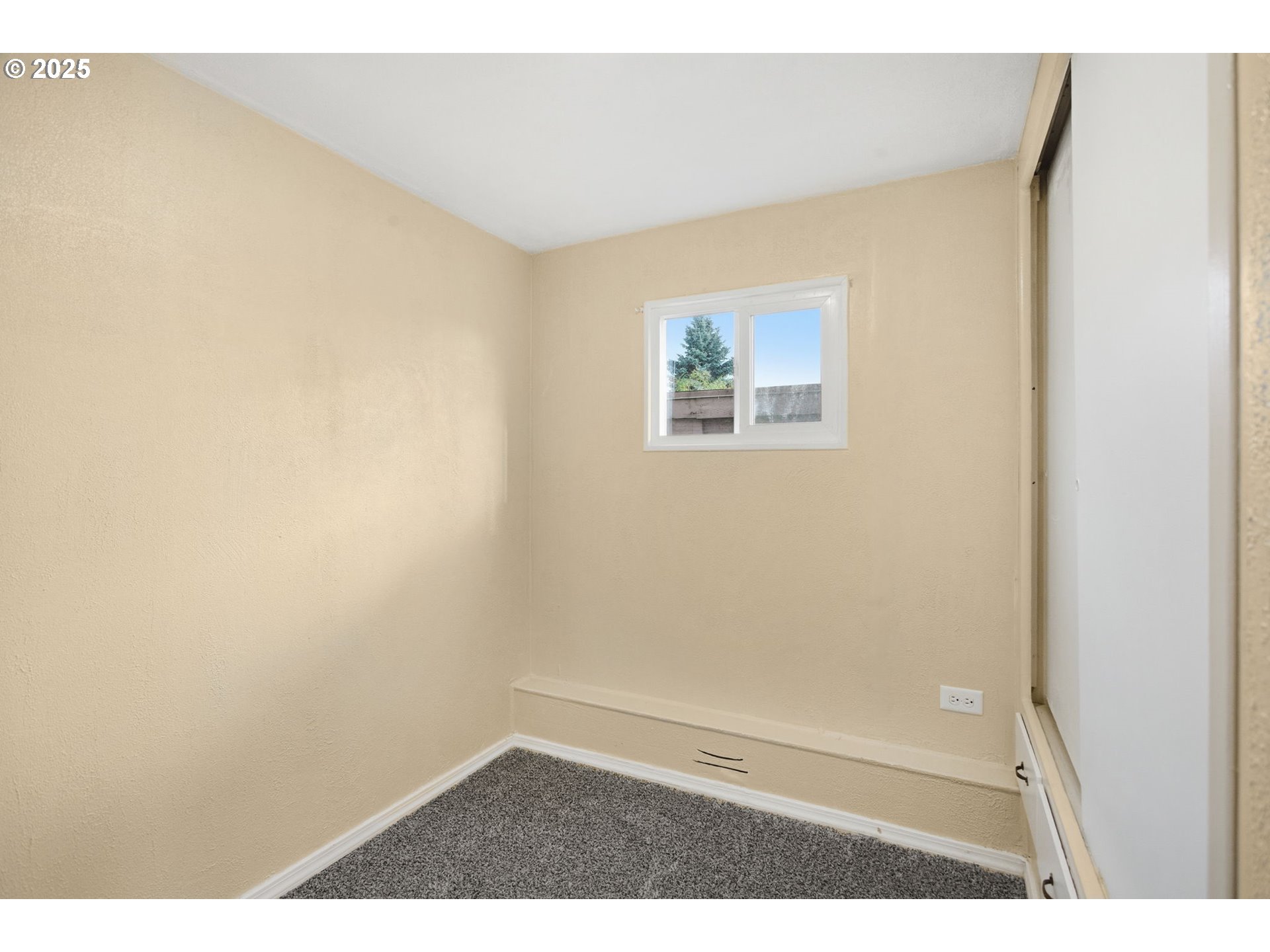 2150 Laura Street, Unit 83 Springfield, OR 97477 - Photo 18 of 40 a view of a small space with wooden floor and a window