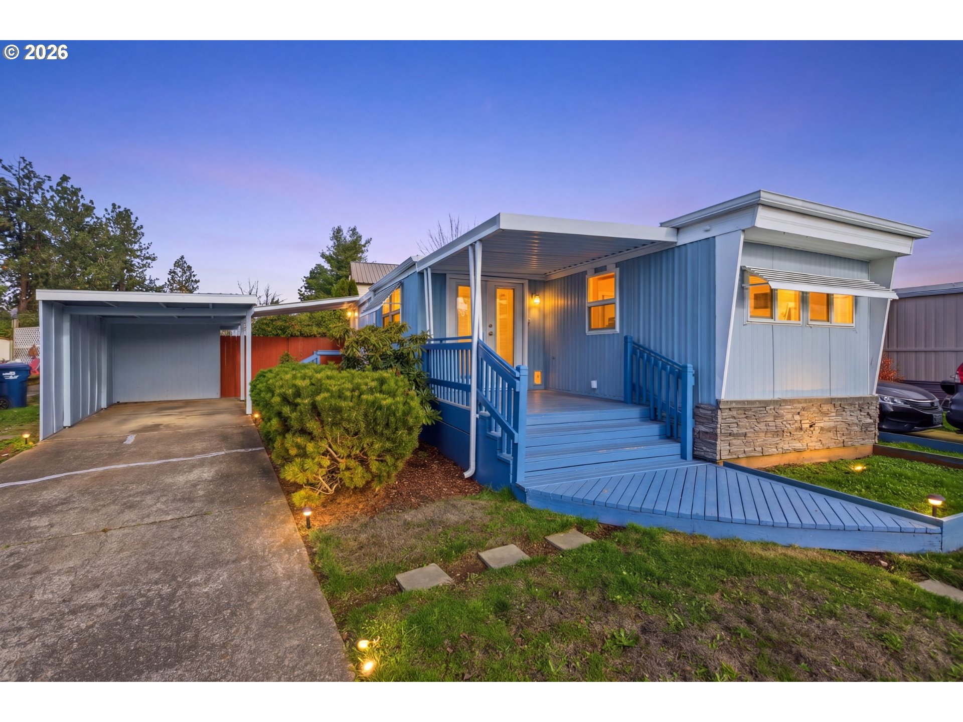 2150 Laura Street, Unit 83 Springfield, OR 97477 - Photo 36 of 40 a view of a house with a patio