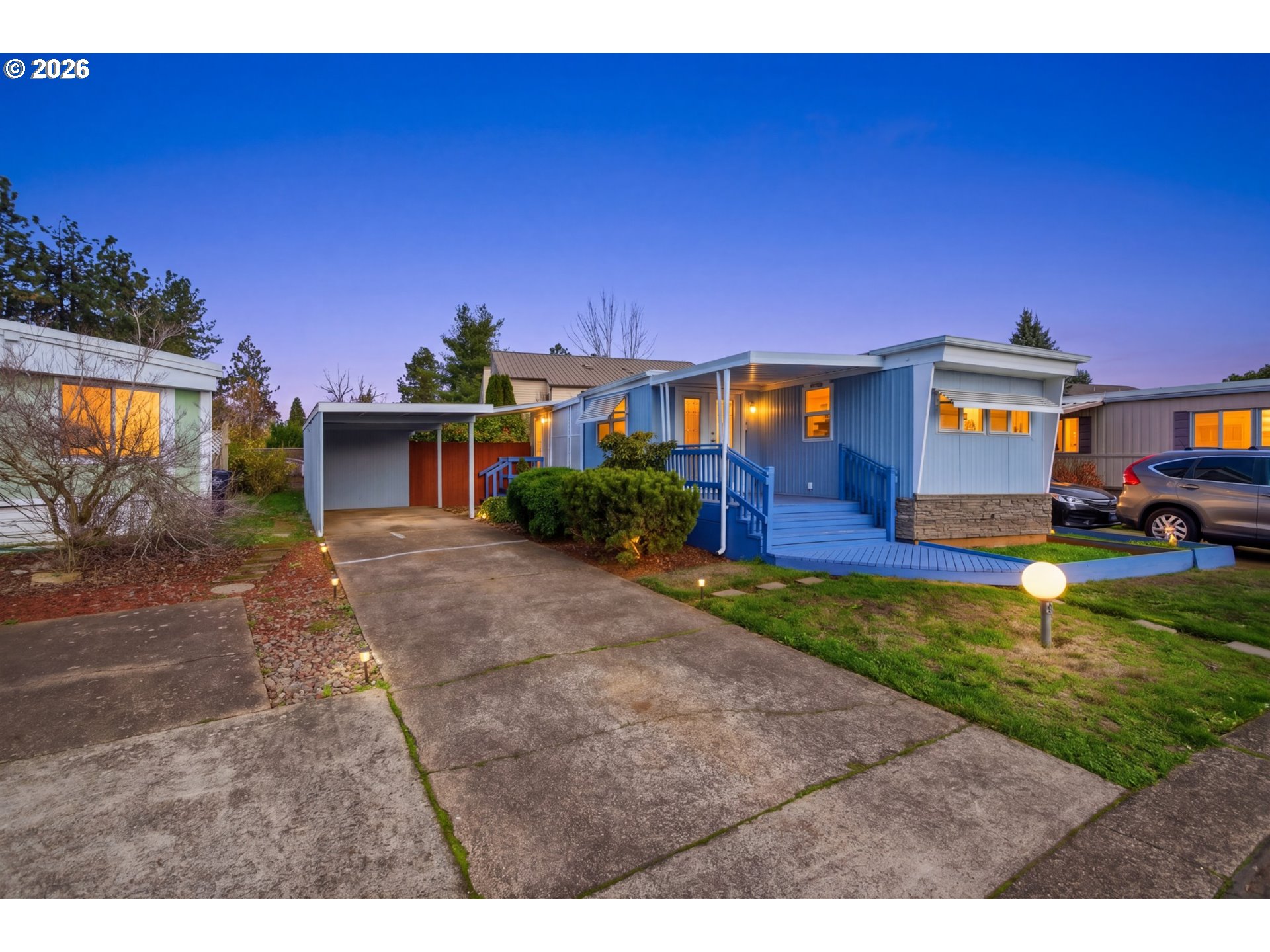 2150 Laura Street, Unit 83 Springfield, OR 97477 - Photo 40 of 40 a view of an house with backyard space and balcony