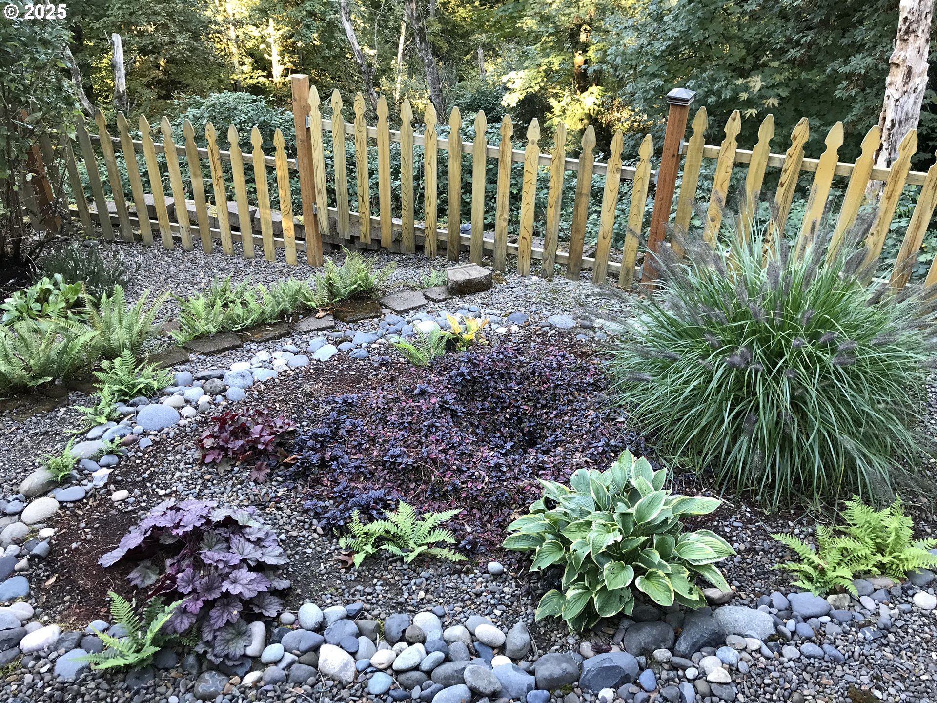 17413 Wake Robin Circle Oregon City, OR 97045 - Photo 2 of 27 a garden view