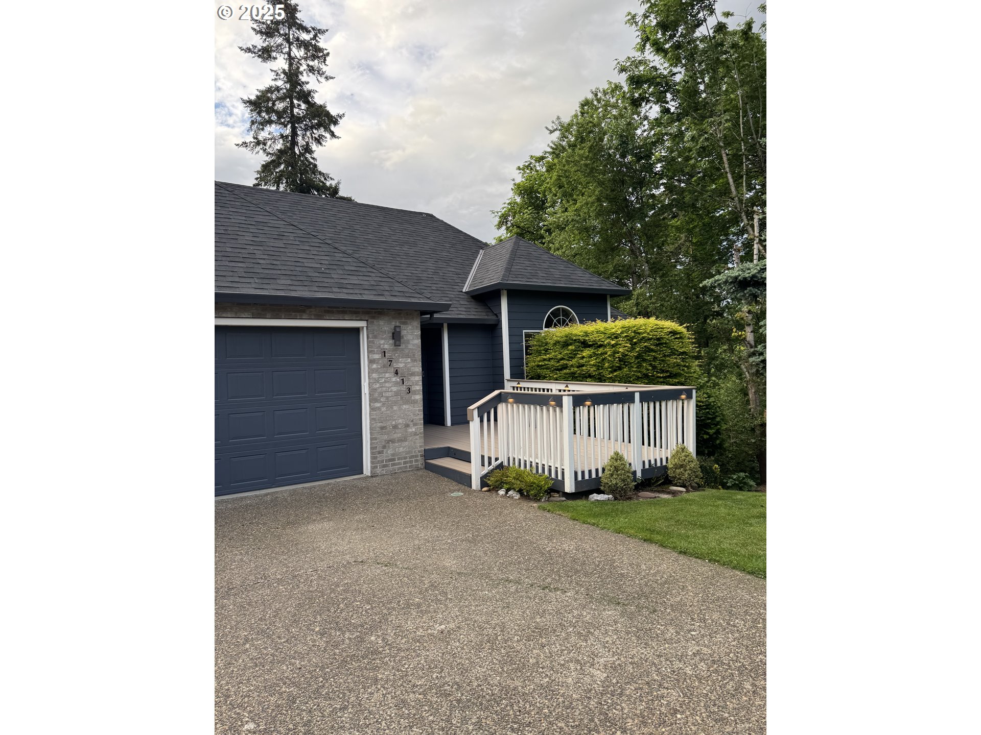 17413 Wake Robin Circle Oregon City, OR 97045 - Photo 26 of 27 a front view of a house with garden