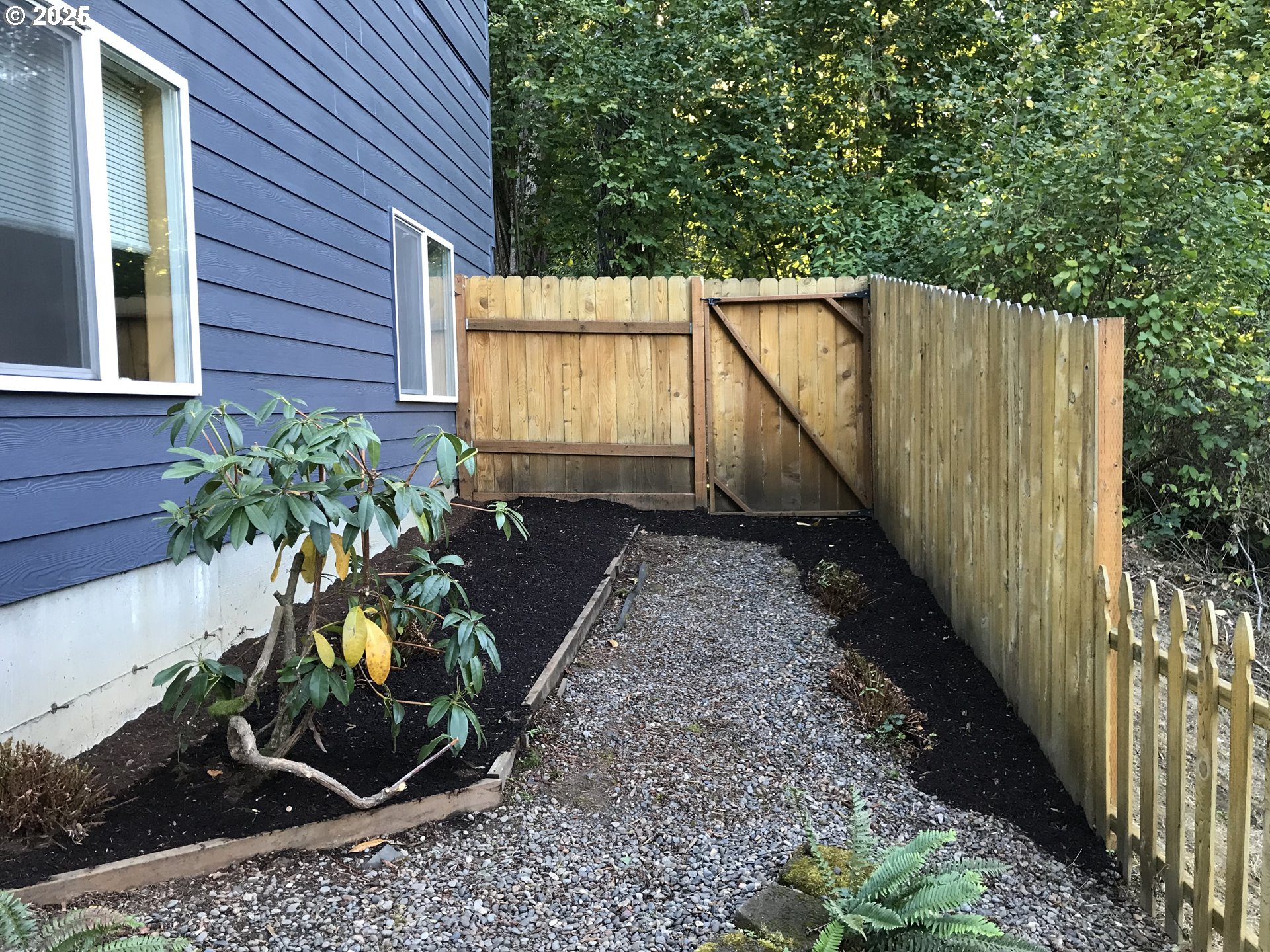17413 Wake Robin Circle Oregon City, OR 97045 - Photo 5 of 27 a backyard of a house with lots of green space