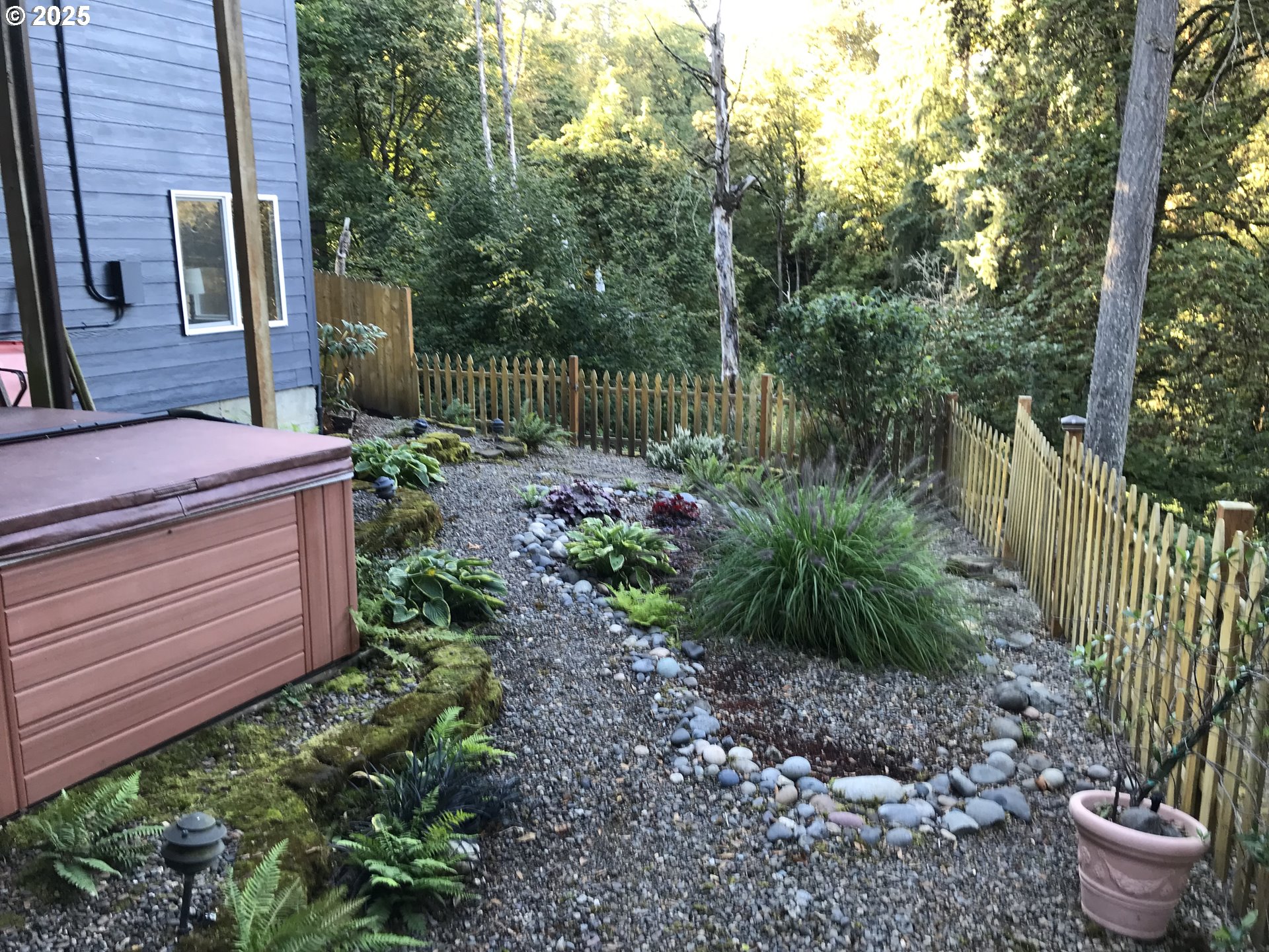 17413 Wake Robin Circle Oregon City, OR 97045 - Photo 6 of 27 a garden view with a seating space