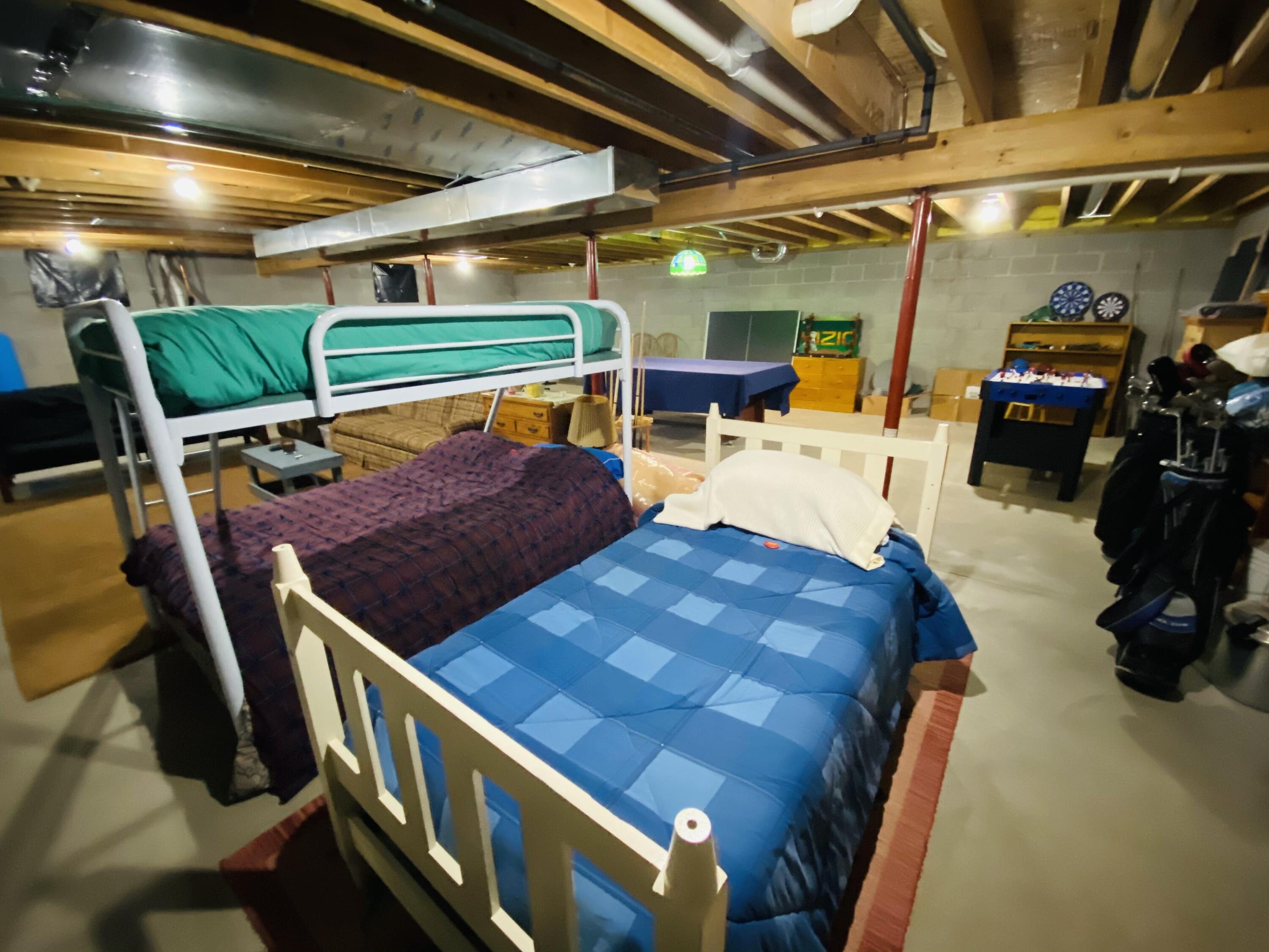 3417 Lakeshore Road Manistee, MI 49660 - Photo 21 of 35 Bunk area in basement