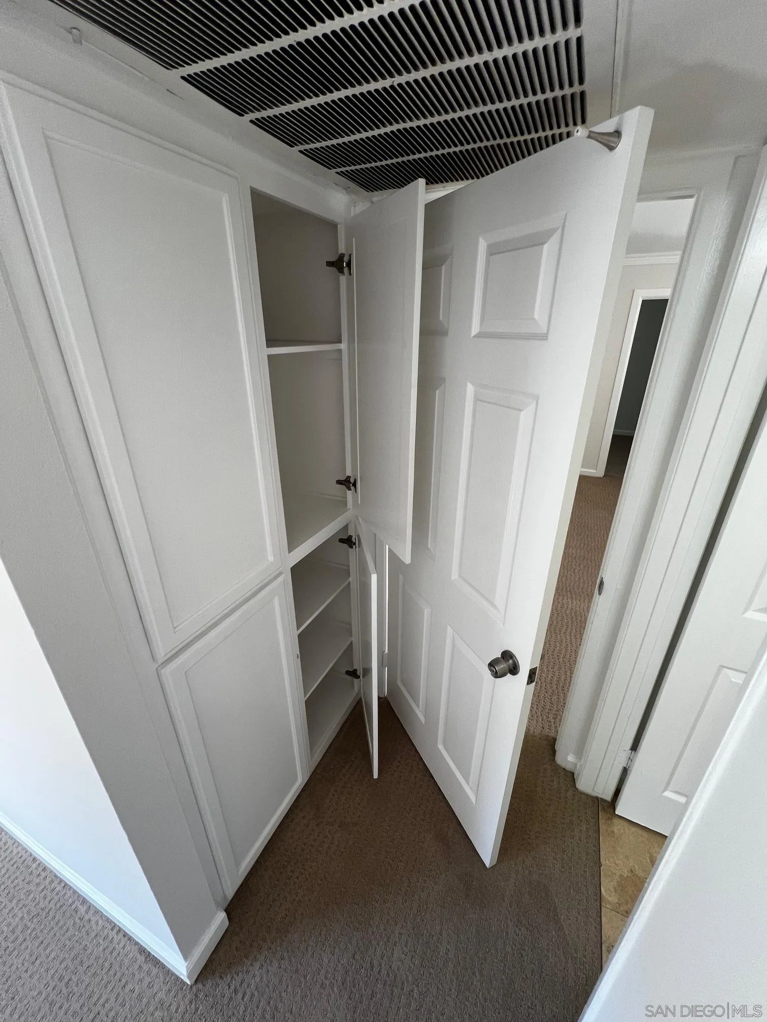 4881 Collwood Boulevard, Unit B San Diego, CA 92115 - Photo 11 of 17 a view of an empty walk in closet