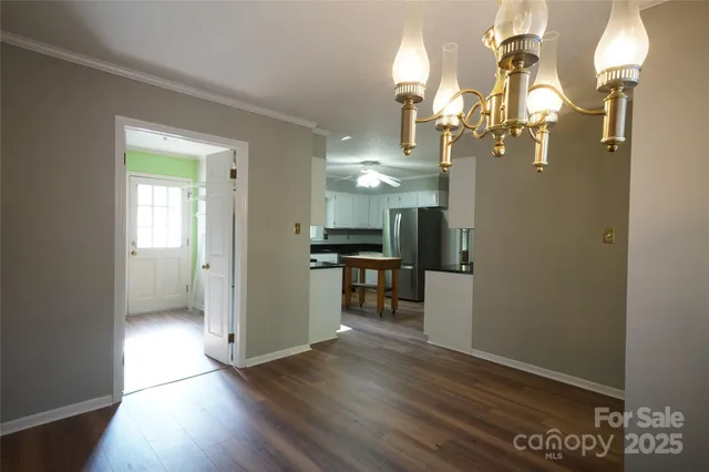 a view of kitchen and dining room