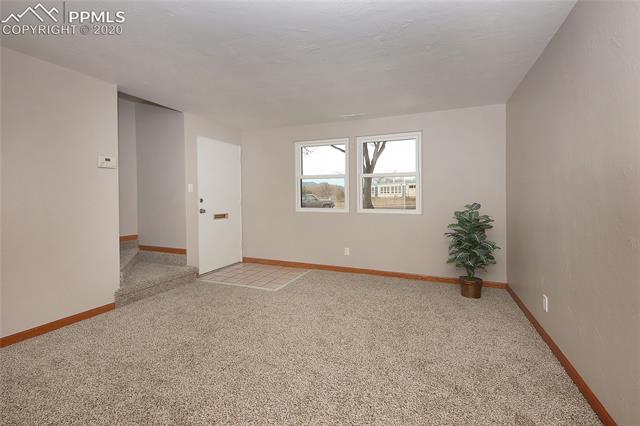 2419 Paseo Road Colorado Springs, CO 80907 - Photo 19 of 23 The carpeting, paint and windows are brand new.
