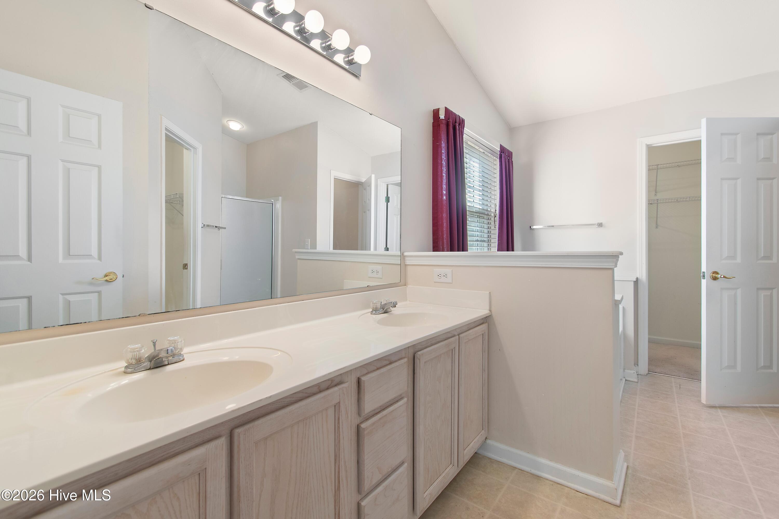 936 Wyndfall Drive Southwest Sunset Beach, NC 28468 - Photo 14 of 37 Primary bathroom