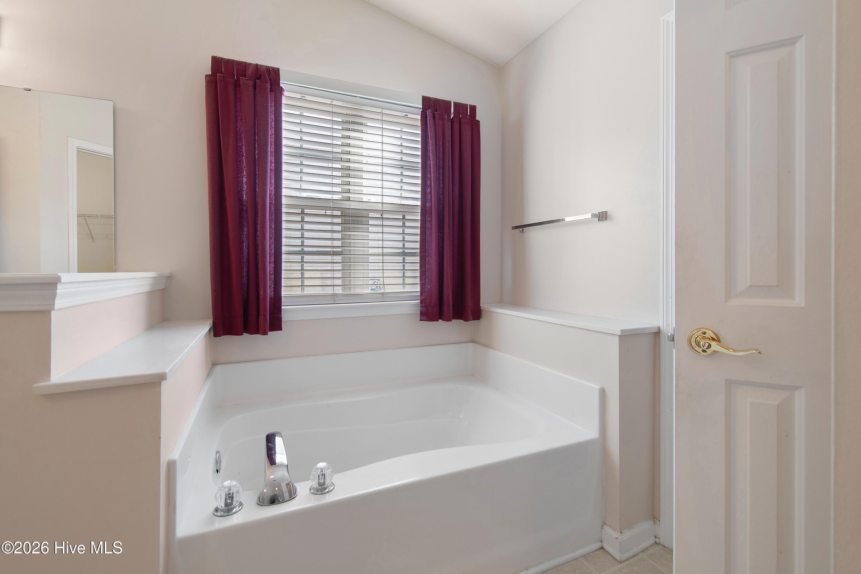 936 Wyndfall Drive Southwest Sunset Beach, NC 28468 - Photo 15 of 37 Primary bathroom