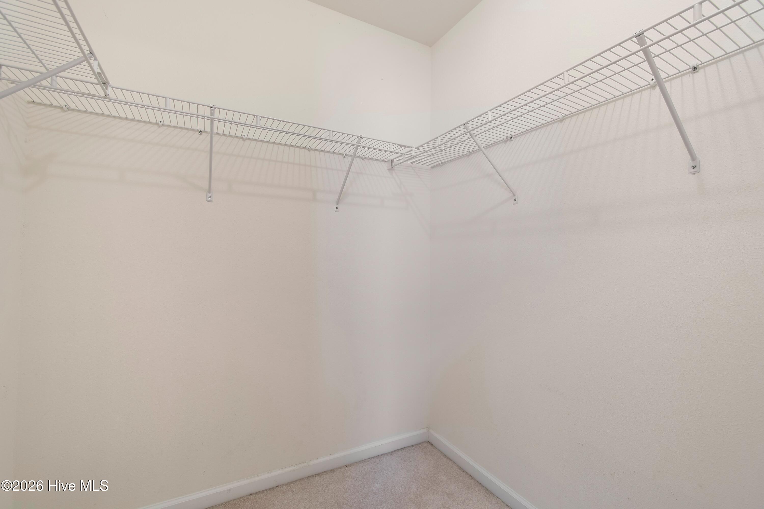 936 Wyndfall Drive Southwest Sunset Beach, NC 28468 - Photo 17 of 37 Primary closet
