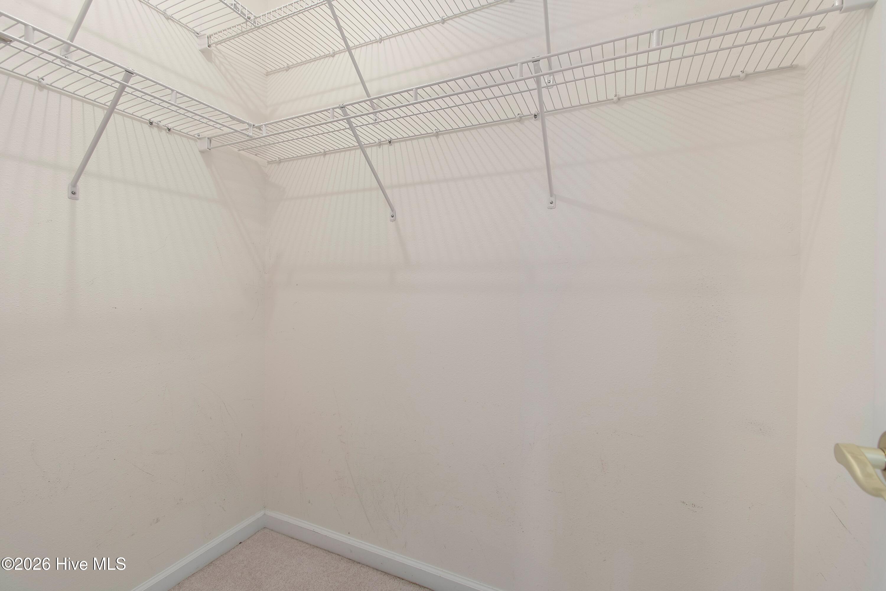 936 Wyndfall Drive Southwest Sunset Beach, NC 28468 - Photo 18 of 37 Primary closet