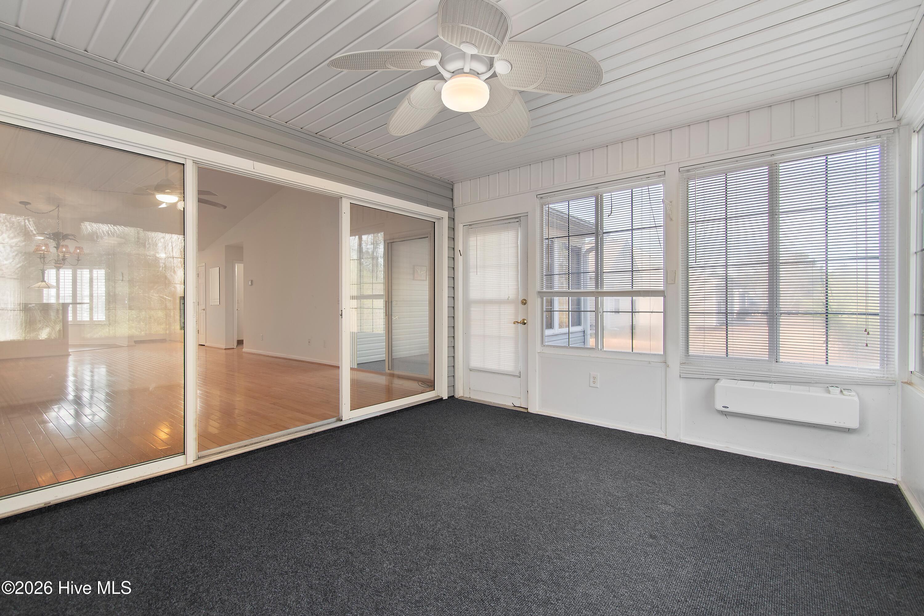 936 Wyndfall Drive Southwest Sunset Beach, NC 28468 - Photo 27 of 37 Sunroom
