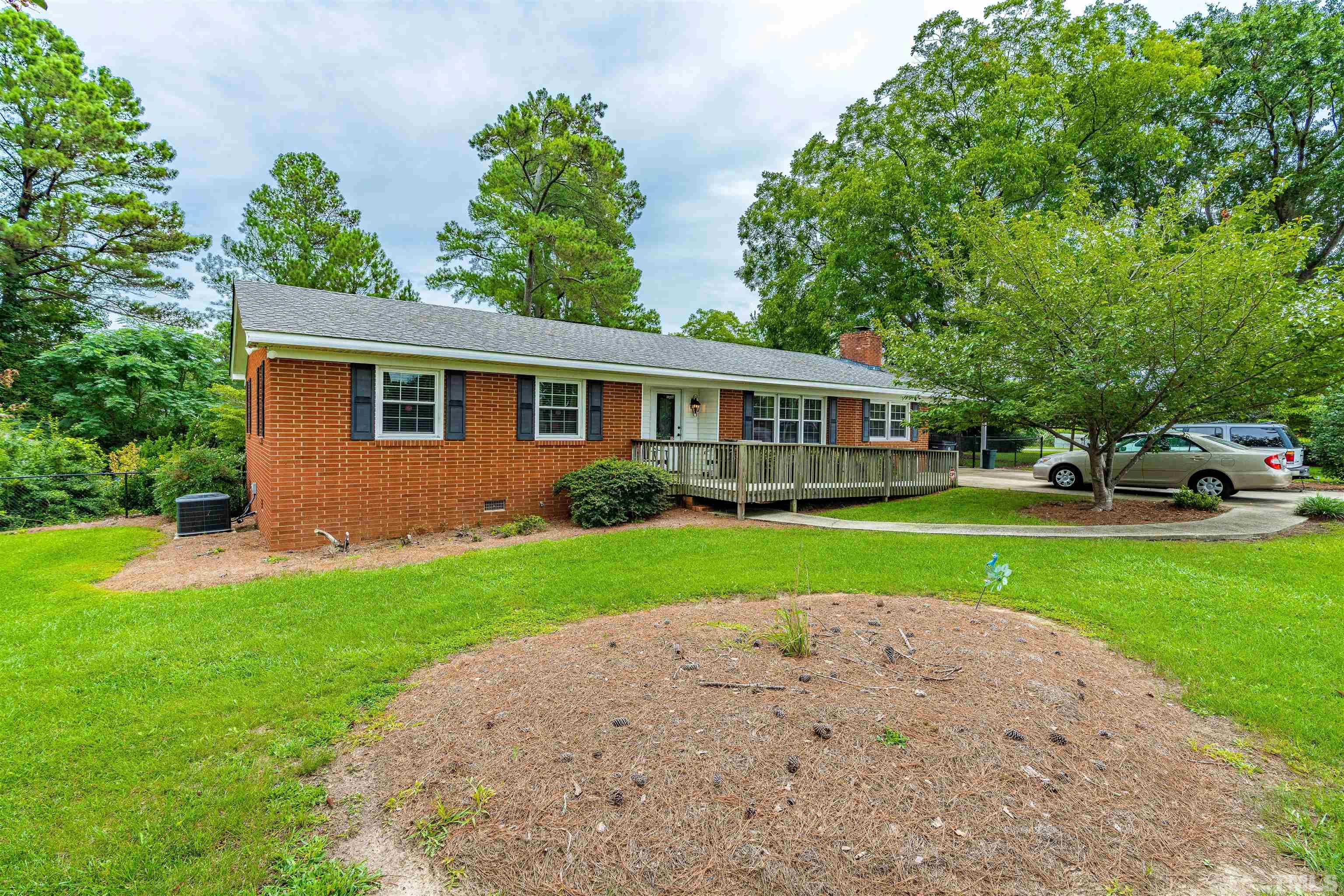2052 Jack Road Clayton, NC 27520 - Photo 1 of 37 a view of outdoor space yard and deck