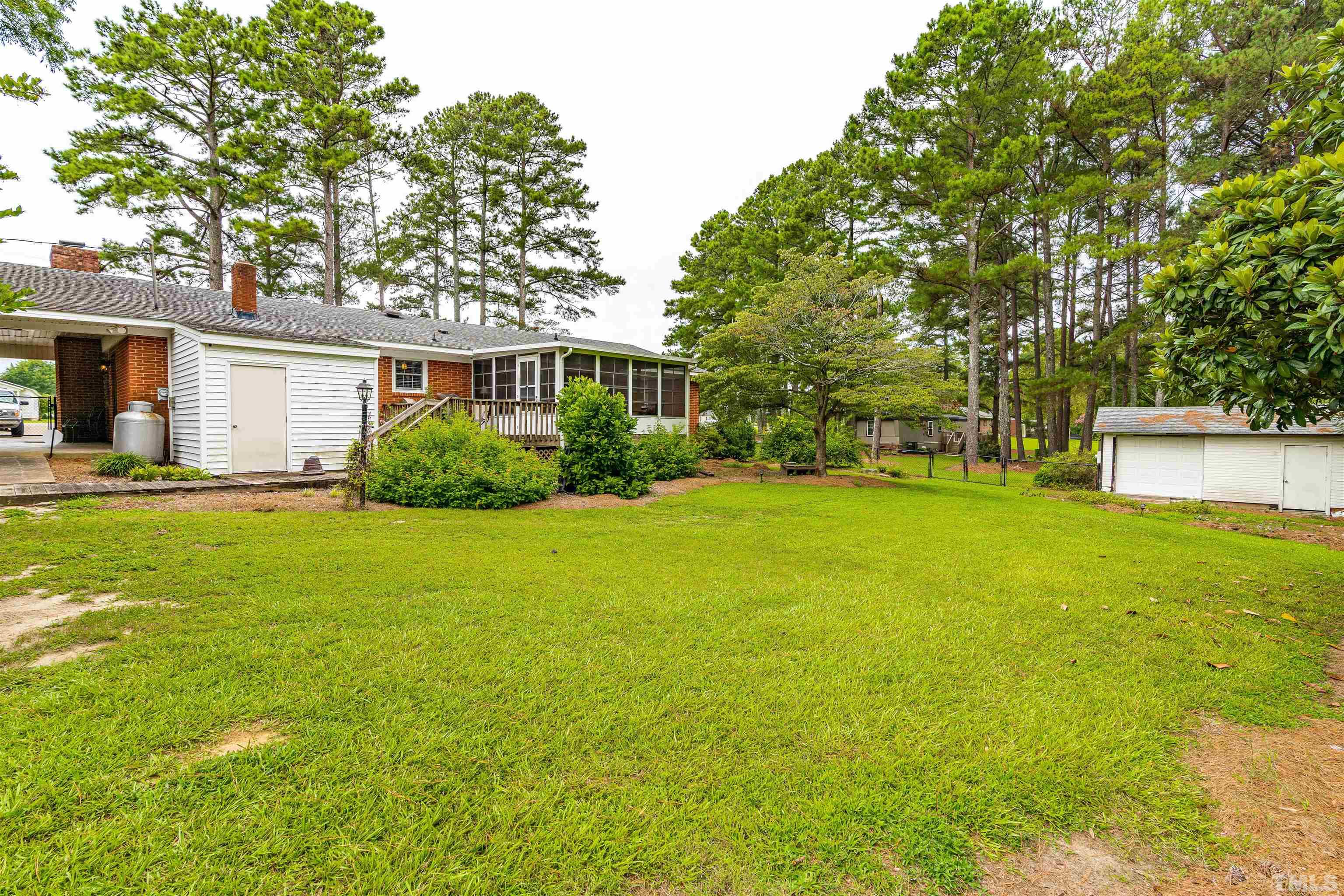 2052 Jack Road Clayton, NC 27520 - Photo 35 of 37 a view of a backyard with a garden