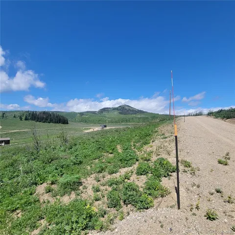 a view of a backyard of a house
