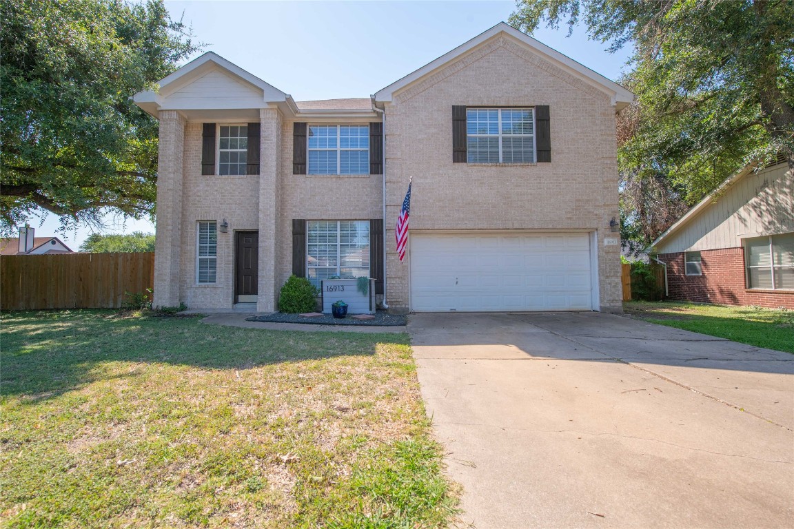 16913 Langland Road Pflugerville, TX 78660 - Photo 1 of 1 a front view of house with yard