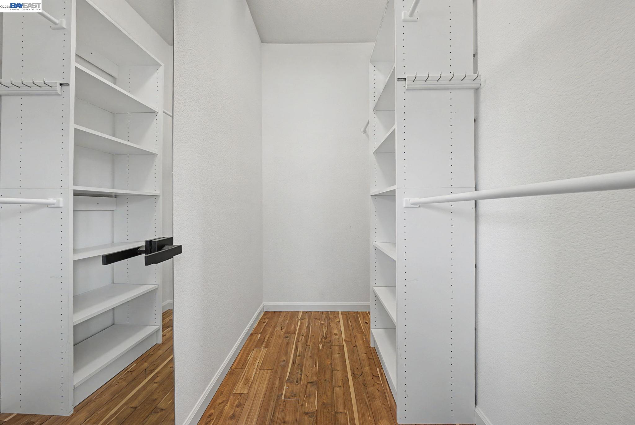 Westside San Ramon, CA 94583 - Photo 34 of 43 a view of walk in closet with empty racks